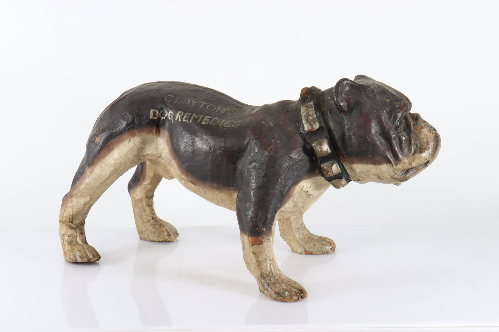 Clayton's Dog Remedies, Dog Advertisements: Clayton's Dog Remedies, Bag Dog Advertisement, Papier Mache Dimensions: 29" L Property from the collection of Seymour Stein.