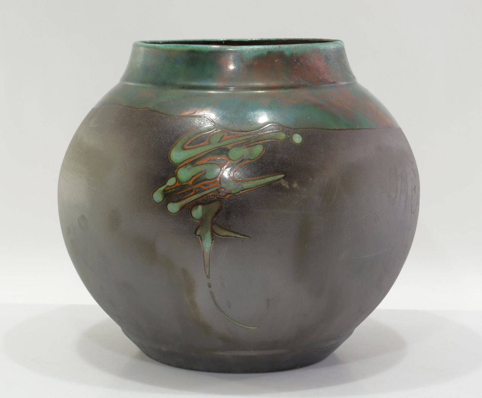 Tony Evans Roku Pottery Jardiniere: Matte glazed lower body. Upper body and symbol writing color in higher gloss glaze, iridescence. Metallic gloss glaze and pebbly or hammered texture interior.Dimensions: 13"H x 14.5 dia.