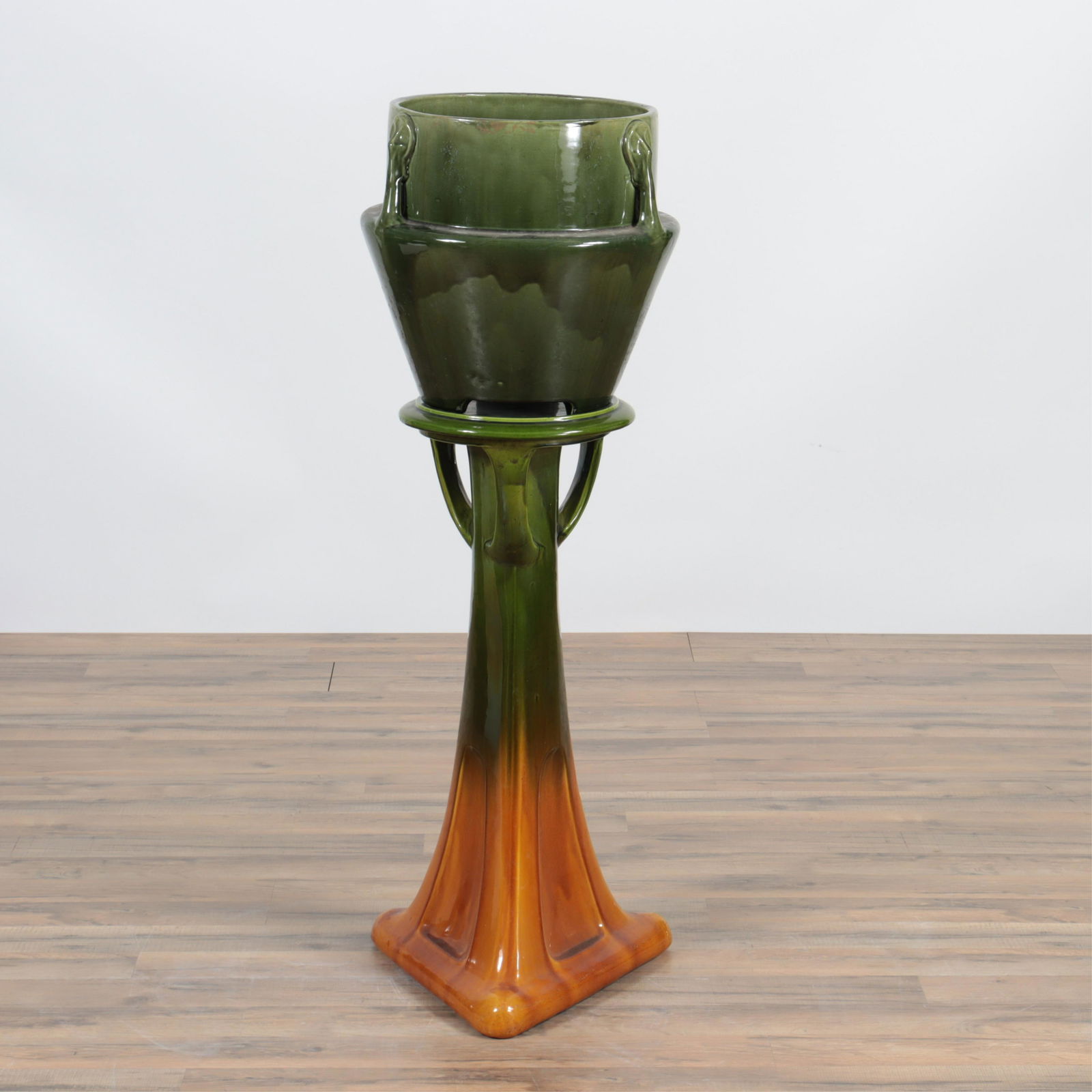 Bretby - Liberty Pottery Jardiniere & Stand: Bretby - English Liberty Pottery Jardiniere & Stand, Early 20th C., impressed marks Dimensions: 44.25" H x 15.5" Dia. Property from the personal collection of Seymour Stein.