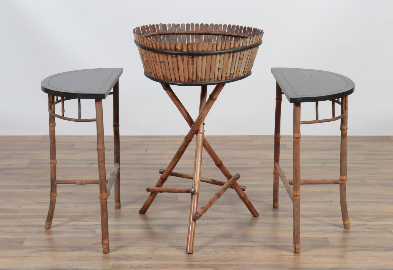 Pair Bamboo Side Tables and Plant Stand: Pair of bamboo and wood demi lune tables along with a tall plant stand with metal tray insert Dimensions: tables 27H x 24W x 12D , stand 27"H x 22"diameter Property from a Manhattan and Connecticut Es
