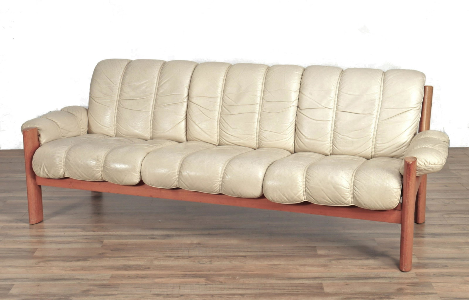 Ekornes - Teak & Leather Amigo Sofa, c.1970: Ekornes - Teak & Leather Amigo Sofa, circa 1970 Dimensions: 27" H x 82" W x 33" D