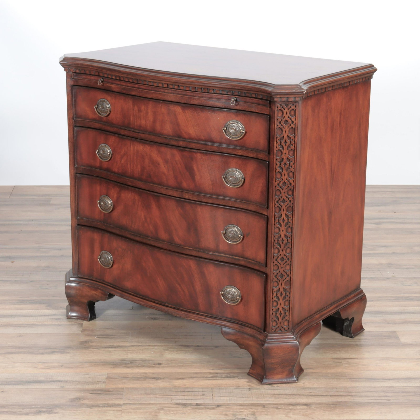 George III Style Blind Fret Carved Chest, Buxton: George III Style Blind Fret Carved Chest of Drawers, by Lloyd Buxton Dimensions: 34" H x 35.75" W x 20" D Property from the estate of an esteemed archaeologist and scholar, Princeton, NJ.