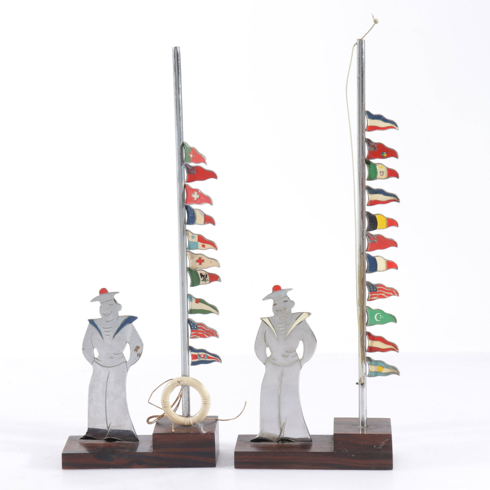 Raymond Sudee Drink Markers: 2 Raymond Sudee Drink Markers, sailor & flags Property from the personal collection of Seymour Stein.