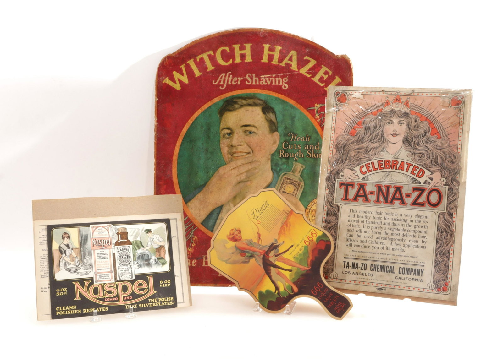 Remedy Related Advertising Signs: 4 Remedy Signs, Witch Hazel, Ta-Na-Zo, 666 Liquid & Nasal Compound Largest 19" H x 14.5" W Property from the estate of Seymour Stein (1942 - 2023).