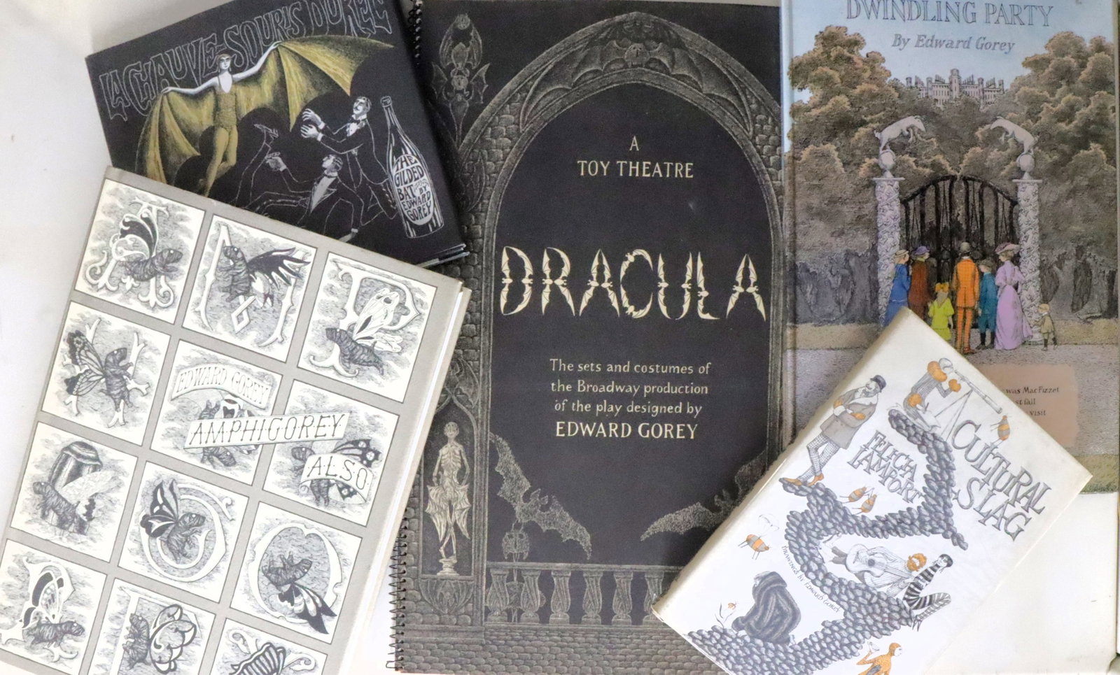 Edward GOREY; Collection: Edward GOREY. - Felicia LAMPART. Scrap Irony. Boston: 1961. Small octavo. Illustrated title and illustrations. Original cloth, dust-jacket (dust-jacket slightly toned); Cultural Slag. Boston: 1966. Sm
