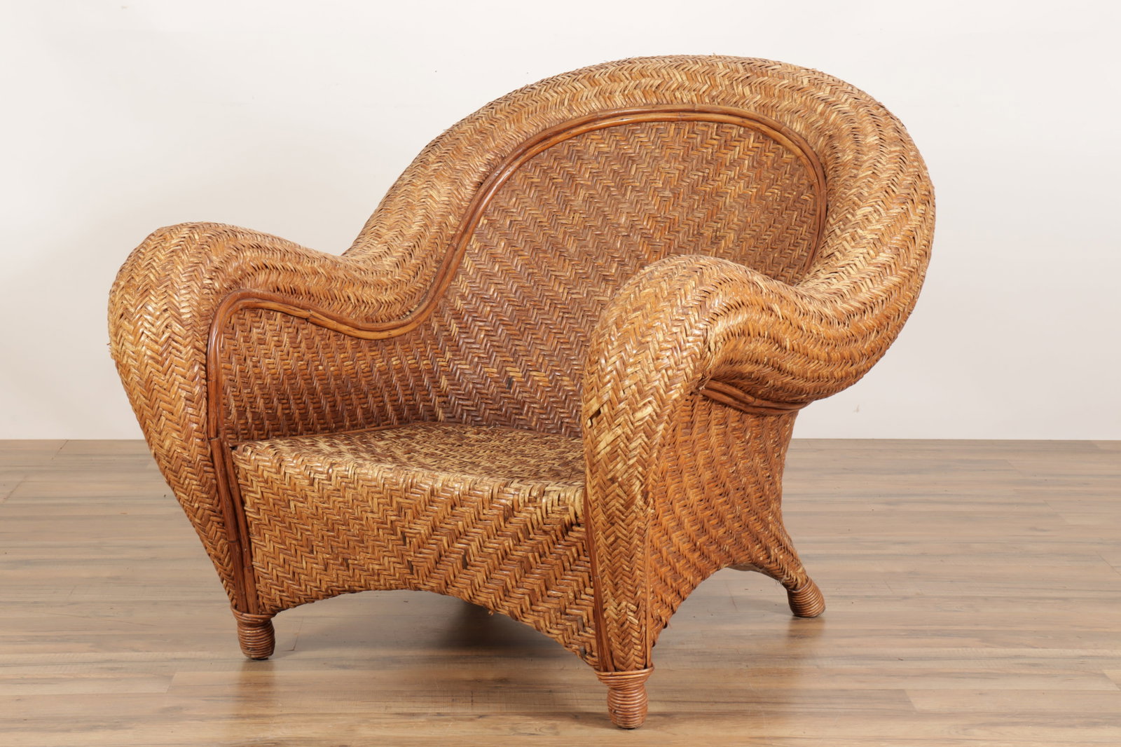 Woven Rattan Lounge Chair: Woven Rattan Lounge Chair with rust color loose cushion33 1/2 x 37 x 44Collection from a Hamptons Long Island New York Home