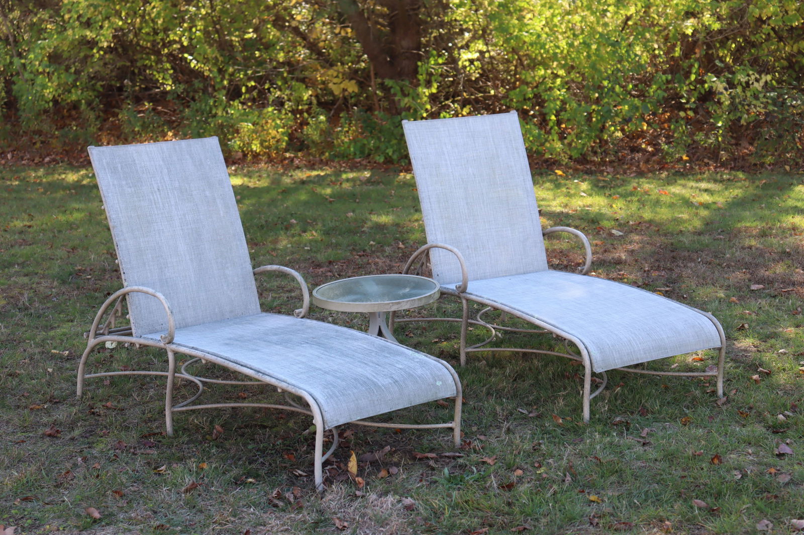 Brown Jordan Outdoor Furniture Chaises: Porch/outdoor furnishings. Two adjustable back chaise with synthetic mesh upholstery, fine speckle paint finish.Also small, round side table.chaise 62"L x 25W