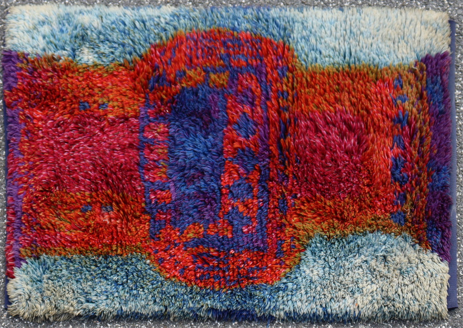 Ritva Puotila Rya Rug 3 x 4-3: Ritva Puotila,Finland, b.1935, Mansikka, Helsinki Soumi, Rya wool rug, c.1950-60,signed, abstract vase form with blue an doff white along border3 x 4-3Collection from a Hamptons Long Island New York H