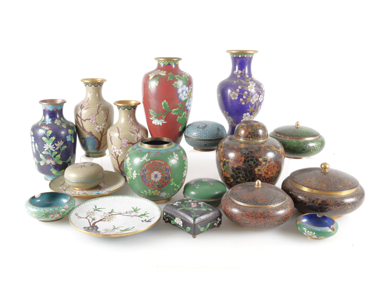 18 Cloisonne Decorative Objects: A variety of vases, covered boxes, shallow bowls and plates.Largest vase: 9" h.Property from a Northwest Connecticut Estate