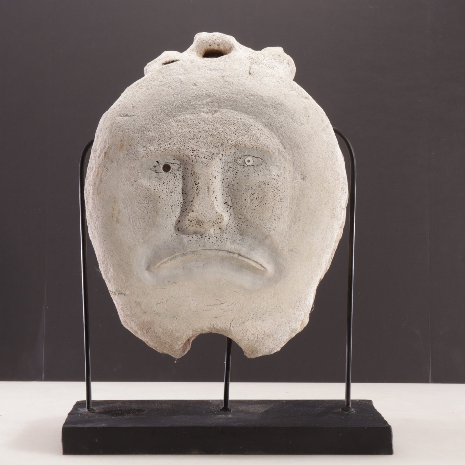 Whale Vertebra - Two Faces - Mayaghaaq: Whale Vertebra with Two Faces Mayaghaaq site, St. Lawrence Island, Alaska c. 800-1400 years old (used as door weight) Provenance: Arctic Art GalleryCheery Creek North Denver, Colorado (receipt availab
