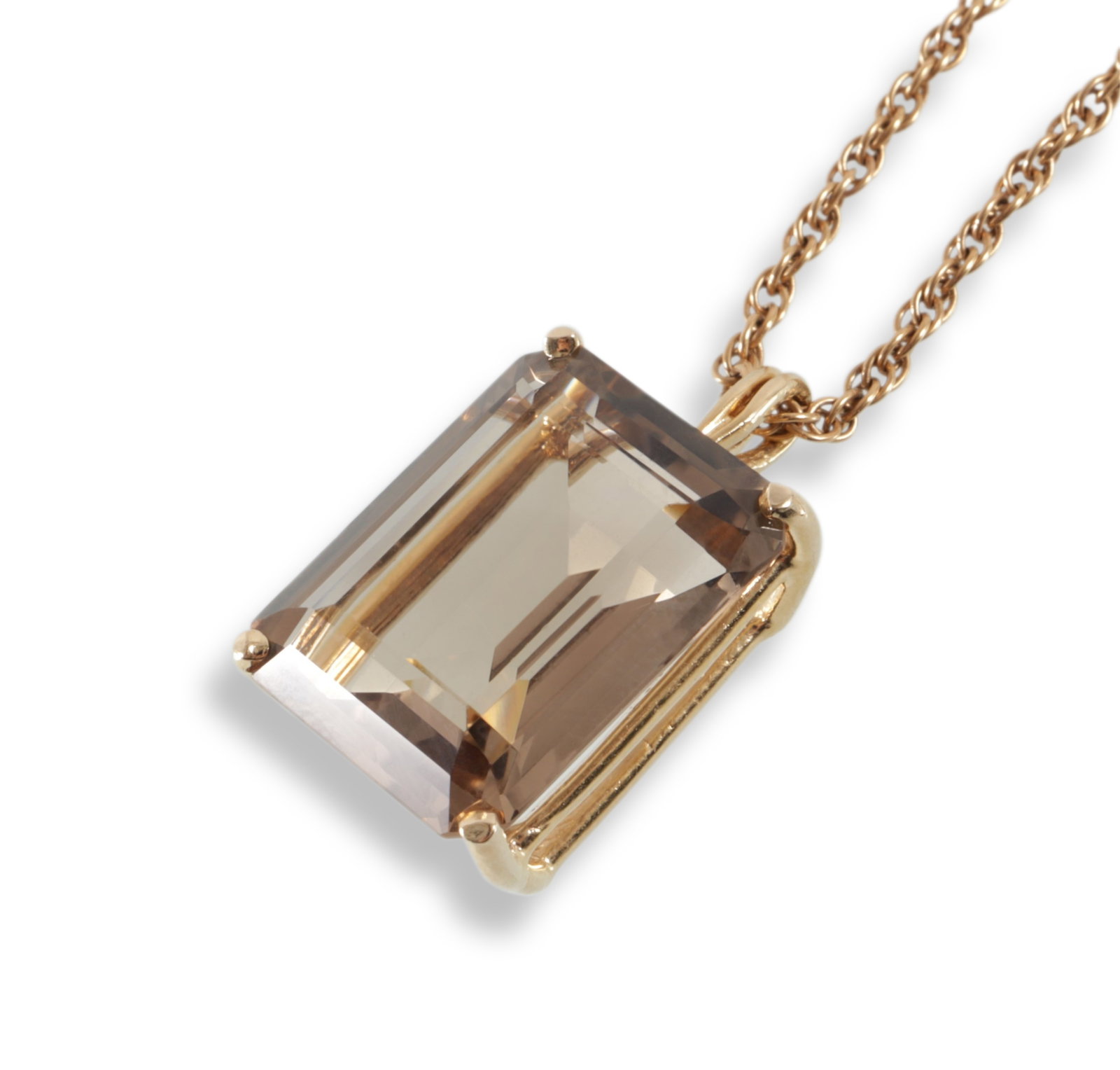 Smoked Citrine Necklace: Emerald cut smoked citrine (19.94 x 15.18 x 10 mm) set in 14k yellow gold, suspended from a 20" 14K yellow gold rope twist chain. Gross weight of 13.9 grams. Property from an Upper East Side Manhattan