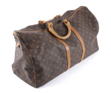 Vintage Louis Vuitton Travel Bag: Vintage Louis Vuitton/The French Company monogram canvas travel bag, late 1970s/early 1980s. 22" W x 12" H x 10" D.Property from a private collection