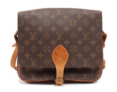 Vintage Louis Vuitton Cartouchiere GM: Vintage Louis Vuitton Cartouchiere GM. Monogram coated canvas, brown leather interior. Date code 873SL. 10.5" x 8.5" x 3". 21" shoulder drop.Property from a Northwest Connecticut collection.