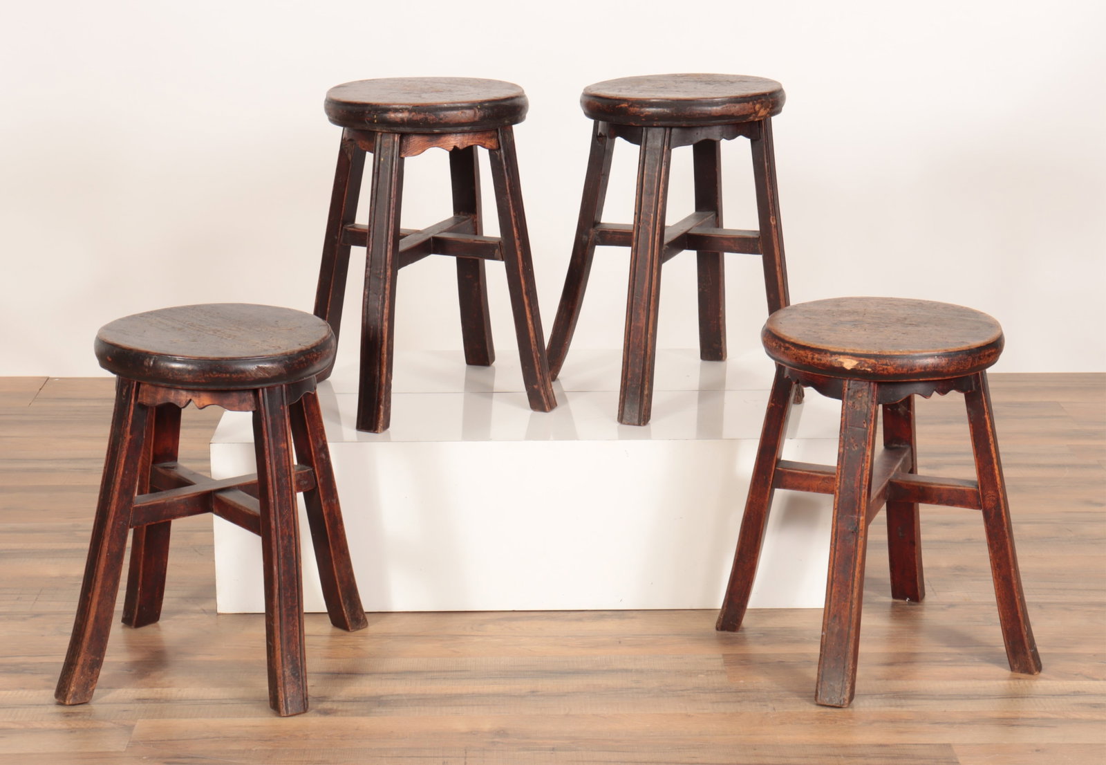 Chinese Stained Softwood Stools: 4 Chinese Stained Softwood Stools 17.5" H x 11.5" Dia. Property from the estate of soap-opera actress Elizabeth Hubbard (1933 - 2023), known for her roles on The Doctors and As the World Turns.