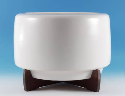 Malcolm Leland - Architectural Pottery Planter: Malcolm Leland - Modern Architectural Pottery Planter ceramic pottery in off white satin finish.Wood stand. 13" H x 17" Dia.