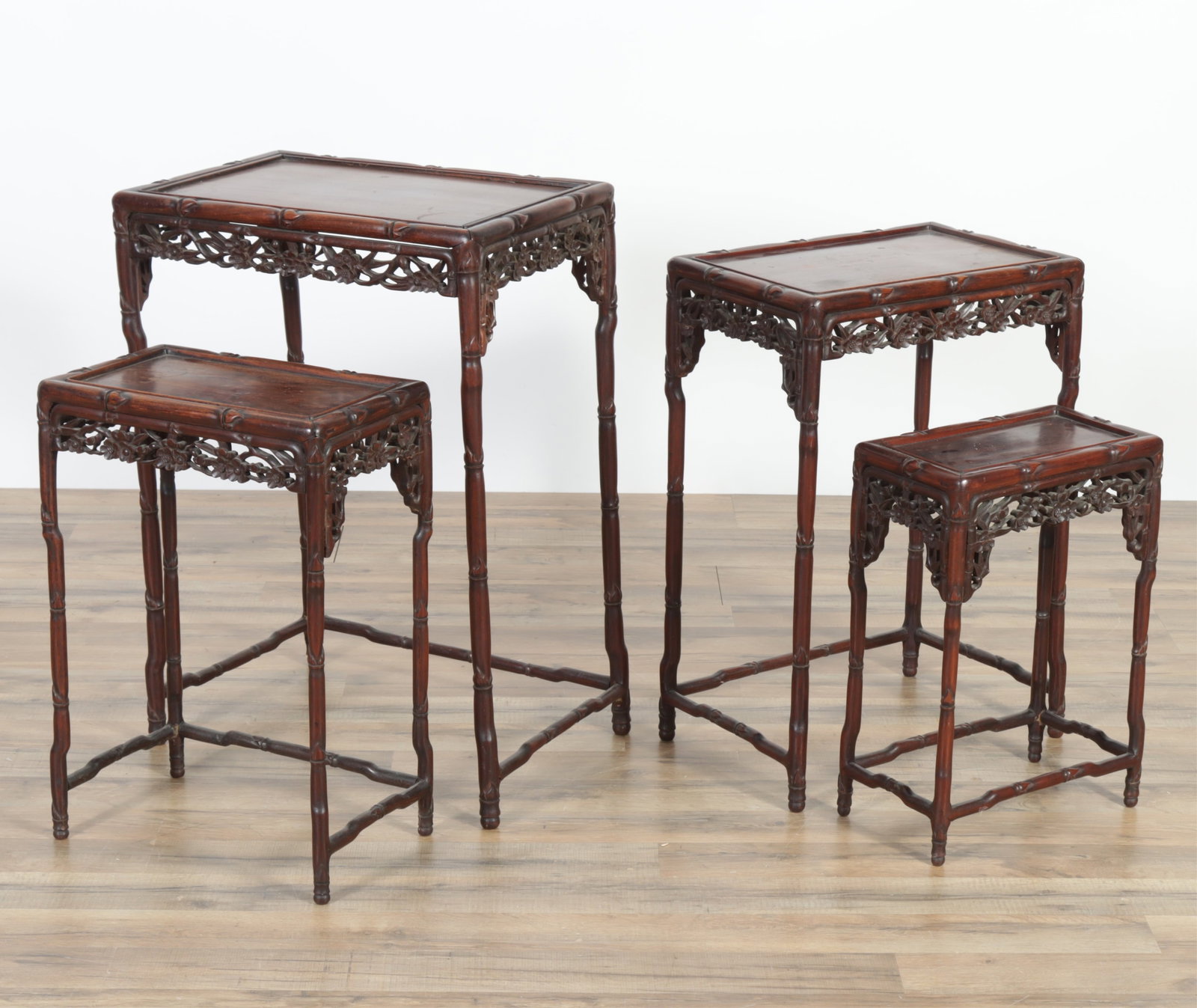 Nest of Four Chinese Carved Hardwood Tables: Nest of Four Chinese Carved Hardwood Tables, early 20th C. Largest 29" H x 20.5" W x 14.5" D. Property from a Northwest Connecticut collection