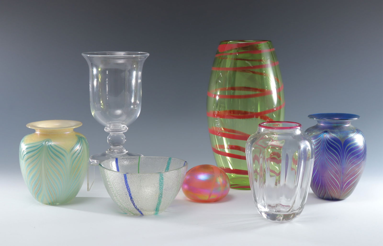 American Art Glass Vases, Fellerman & Others: Group of American Art glass vases and paperweight, includes a tall spiral design vase signed Philip Taylor, 2 Tiffany/Loetz style Stephen Fellerman signed vases with pulled feather designs dated 85',