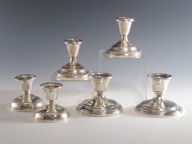 Three Pairs of Sterling Silver Candlesticks
