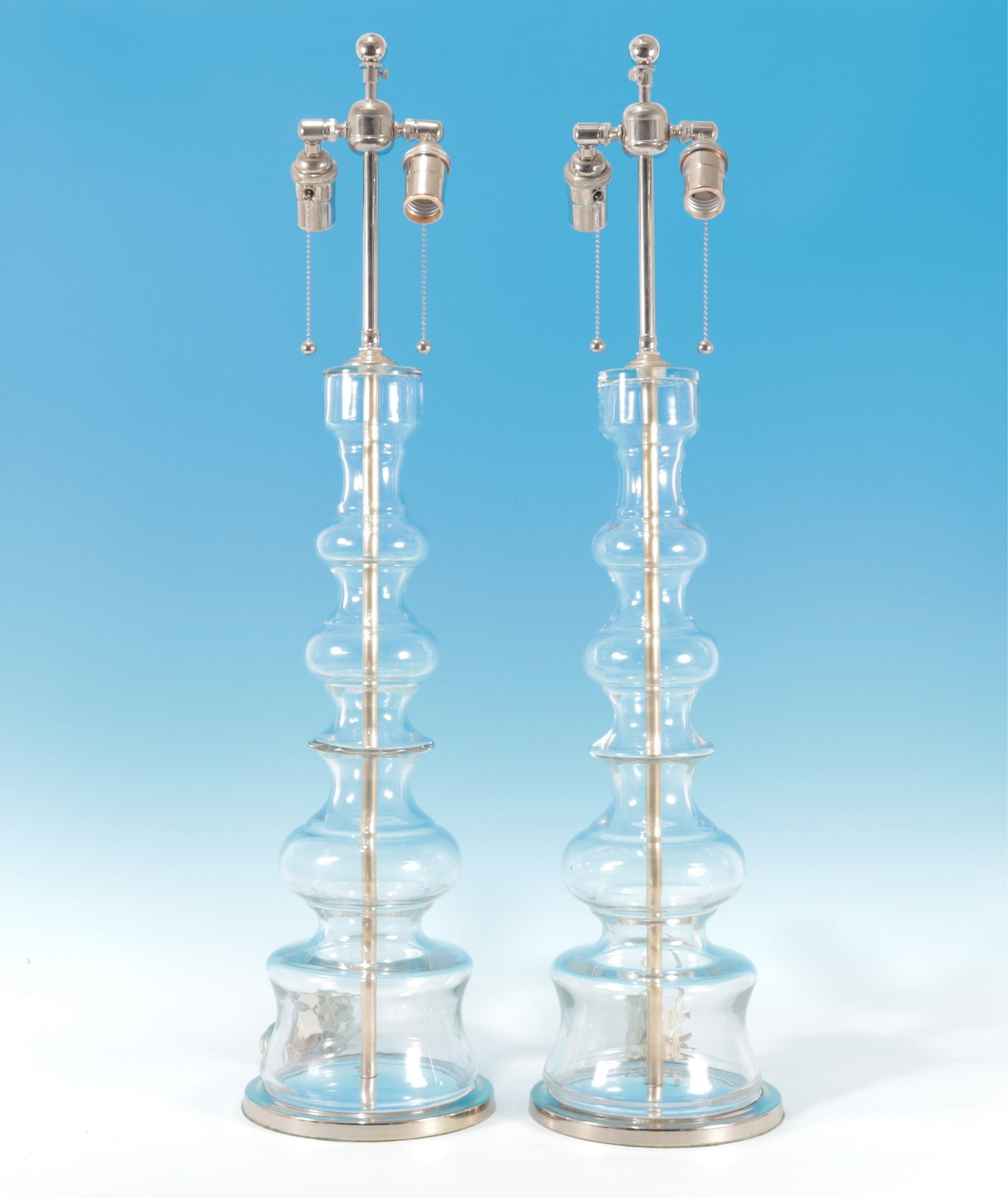 Pair Contemporary Glass Baluster Lamps: Pair Contemporary Glass Baluster Lamps Finial height: 33.75" Property from a renowned fashion executive, Washington, CT.