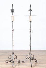 Pair of Baroque Style Polished Iron torchier Lamps