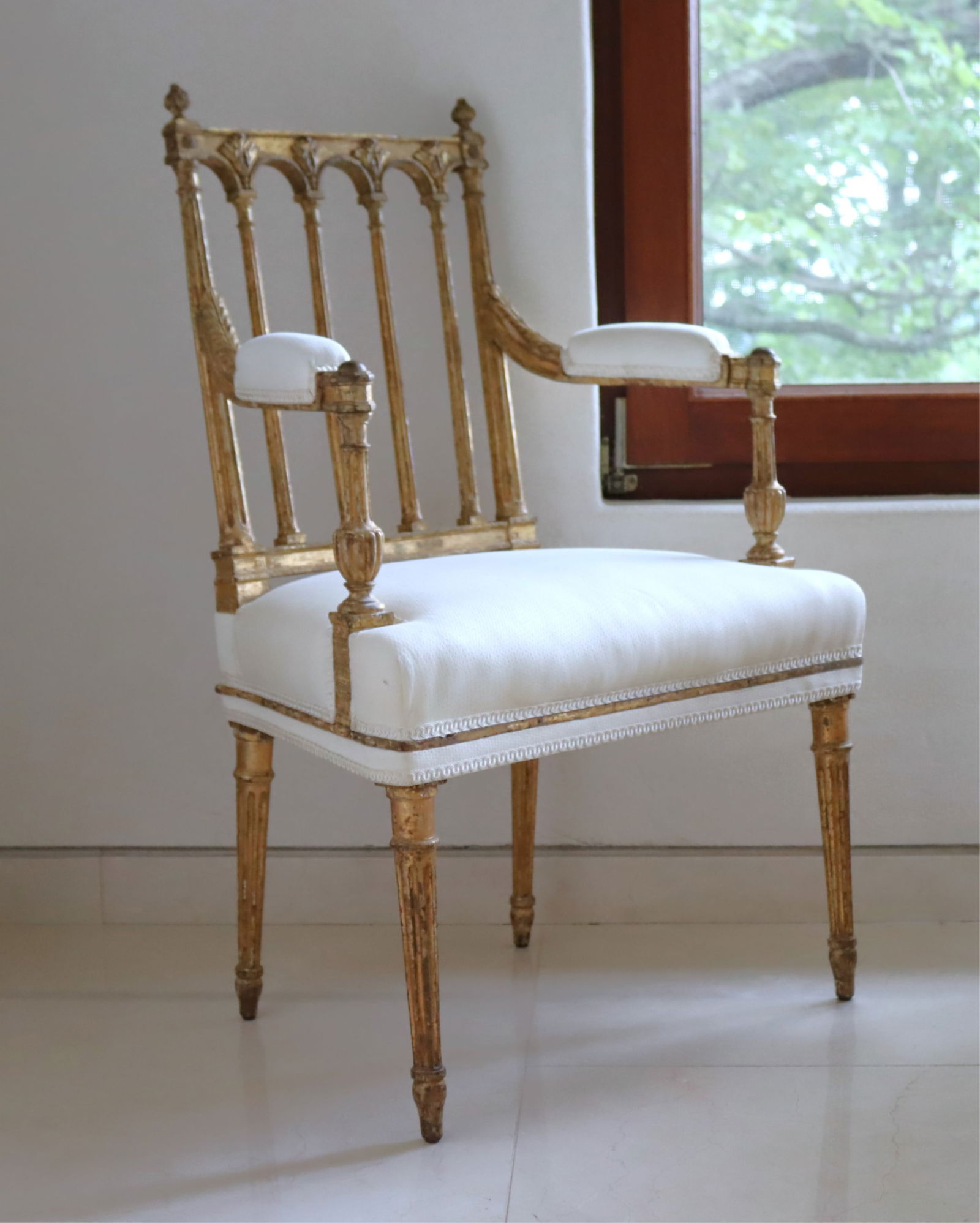 Napoleon III Giltwood Fauteuil: Napoleon III Giltwood Fauteuil, mid 19th Century,Upholstered in white fabric.38" H x 24.75" W x 21" DProperty from a renowned fashion executive, Washington, CT.