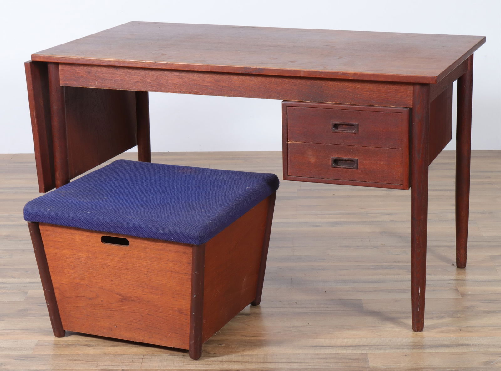 Arne Vodder - Frem Rojle Teak Desk & Stool: Arne Vodder Teak Desk for H. Sigh & Sons, two sliding drawers, drop leaf along left side, along with a Frem Rojle storage bin stool, bottom stamped Made in Denmark28 x 48 x 26, leaf 16, storage bin st