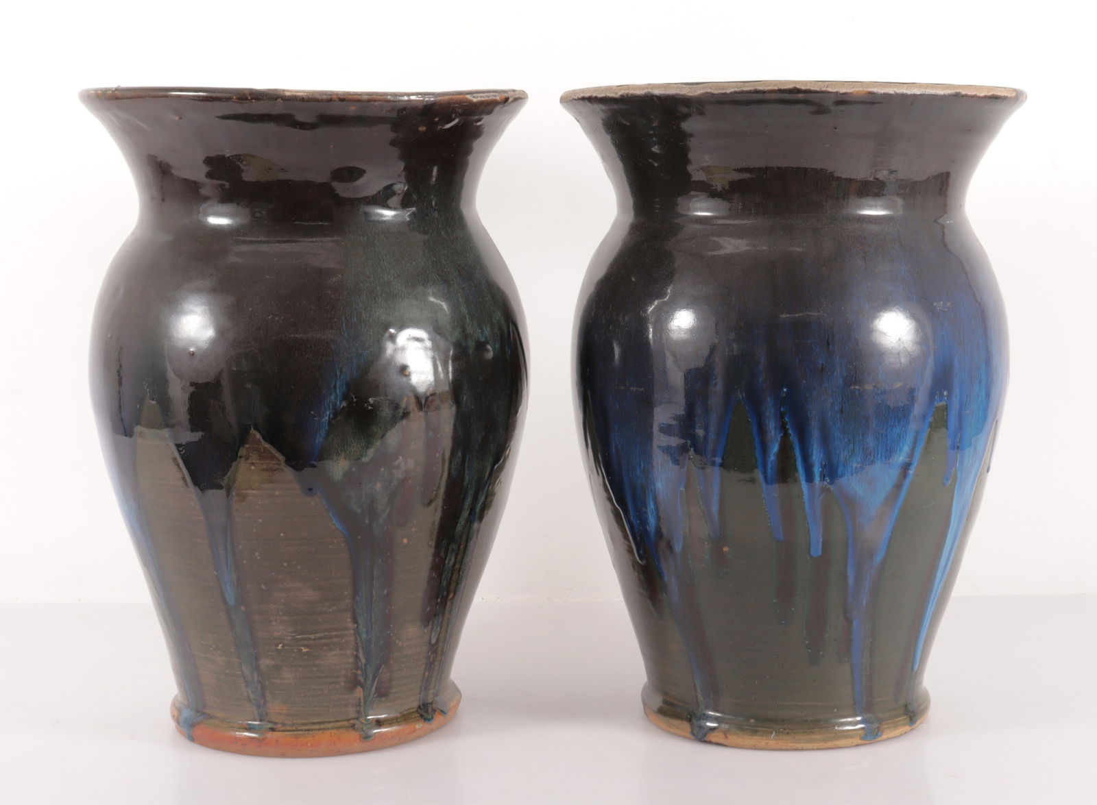 Pair Large Blue / Green Acid drip Earthenware Vase: Pair of blue / green acid drip vases. Stamped "71" on inside of vase.12" Rim Dia. 17" HProperty from a renowned fashion executive, Washington, CT.
