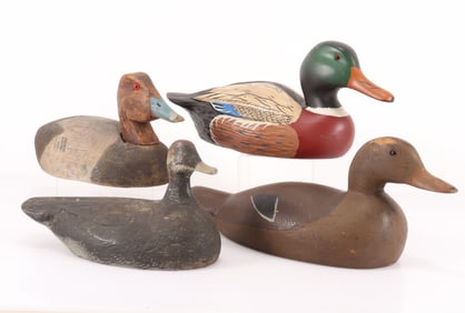 Four Wooden Decoys
