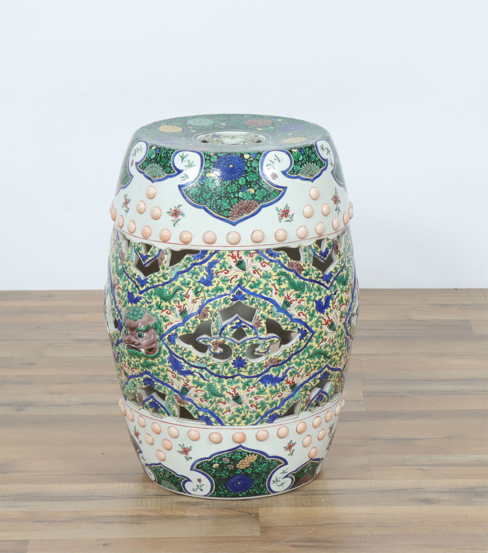 Chinese Style Foliate Porcelain Garden Stool: Chinese Style Foliate Porcelain Garden Stool, reticulated barrelDimensions: 15.75" H x 15' Dia.Property from a private Manhattan collection