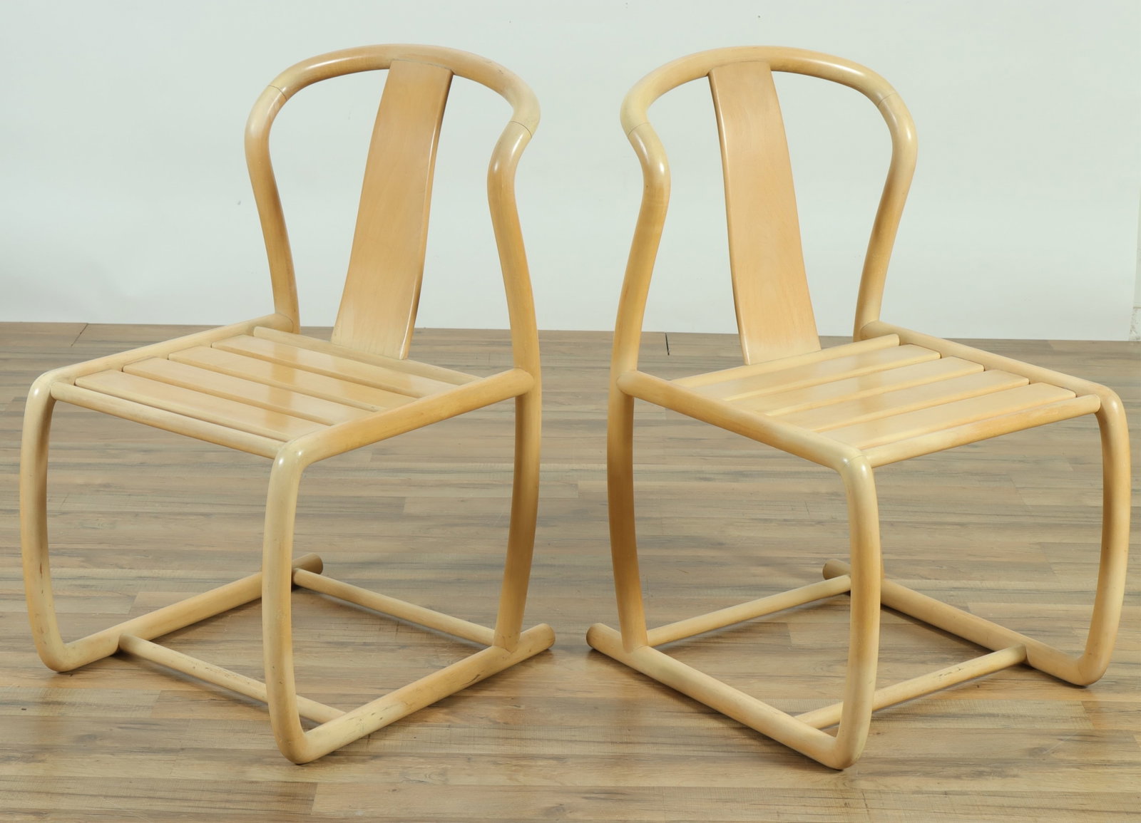 Pair of Tecnosedia Beech Side Chairs: Pair of Tecnosedia Beech Side Chairs Dimensions: Chair 34.5" H x 20.25" W x 24" D From a Manhattan Residence