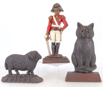 Three Victorian Cast Iron Door Stops