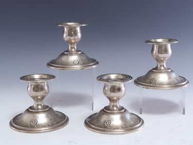 Four Sterling Silver Candlesticks