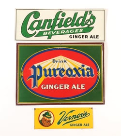 Three Ginger Ale Signs
