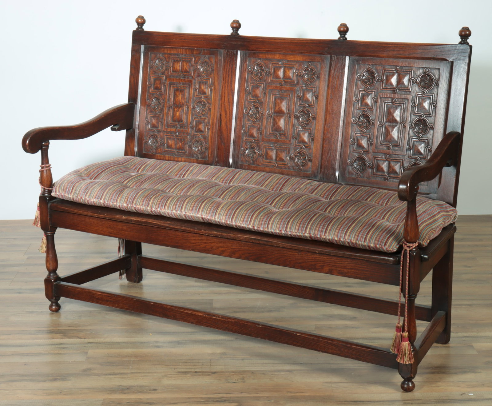 English Baroque Revival Oak Hall Settle, E. 20th C: English Baroque Revival Oak Hall Settle, Early 20th C., geometric carved, painted bench 41.5" H x 58" W x 25" D Property from the estates of Thomas Johnson Hubbard and Anne Attfield Hubbard of Bronxvi
