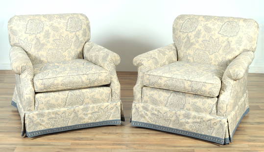 Pair Modern Upholstered Club Chairs: Pair Modern Upholstered Club Chairs, upholstered foliate ivory brocade, with lace fringe 33" H x 36 W x 34" D Property from the estates of Thomas Johnson Hubbard and Anne Attfield Hubbard of Bronxvill