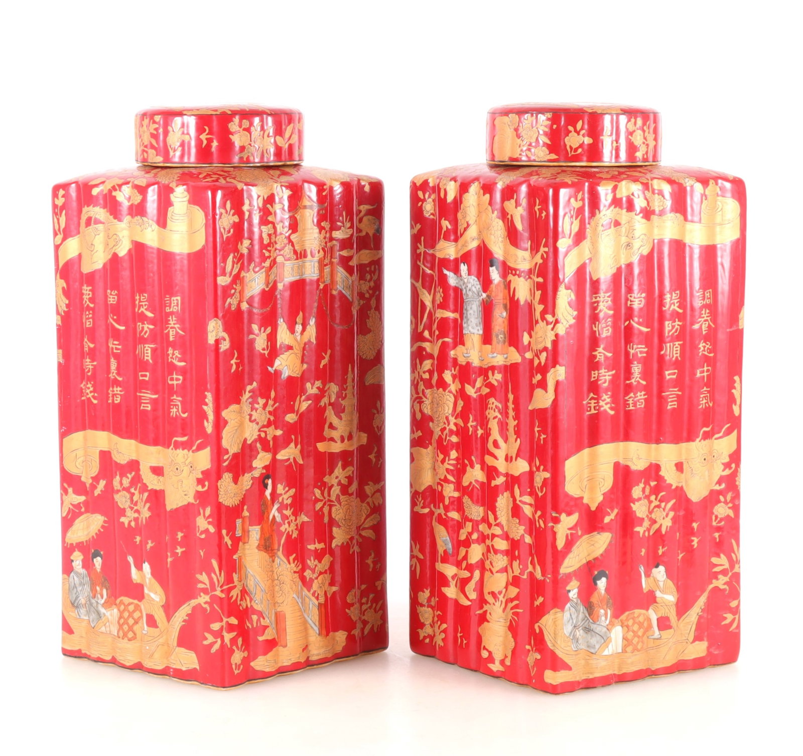Large Pair Chinese Scarlet Chinoiserie Canisters: Pair of large Chinese scarlet glazed and Chinoiserie decorated square lidded canisters, 20th Century, with lobed sides decorated allover with characters, figures, birds, butterflies, dragons and build