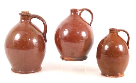 Three Redware Jugs, New England, 19C
