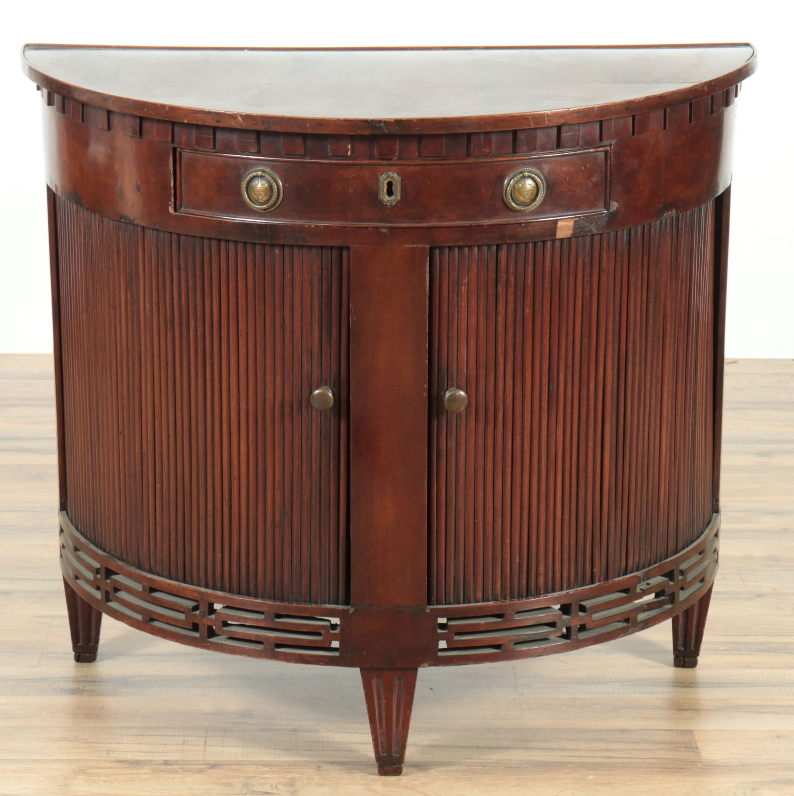 Dutch Classical Mahogany Demilune Cabinet, 18th C.: Dutch Classical Mahogany Demilune Cabinet, Late 18th C., tambour door. 31.5" H x 35.75" W x 18.25" D Property from a private Manhattan collection.