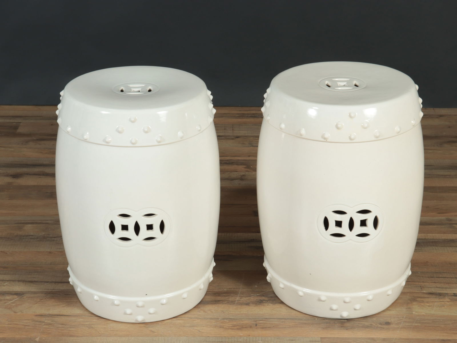 Pair of Chinese White Porcelain Garden Stools: Pair of Chinese White Porcelain Garden Stools, Christie's International label 19.75" H x 15" Dia. Property from a Washington Connecticut Art Collector