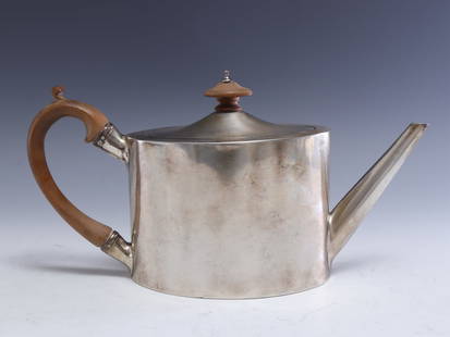 Henry Chawner Sterling Silver Tea Pot, 1826: Henry Chawer, London, sterling silver tea pot with wooden handle and knob, circa 1826. Marked on bottom. 14.23 ozt. 5.5" H x 10.5" D x 3.75" W Property from the estates of Thomas Johnson Hubbard and A