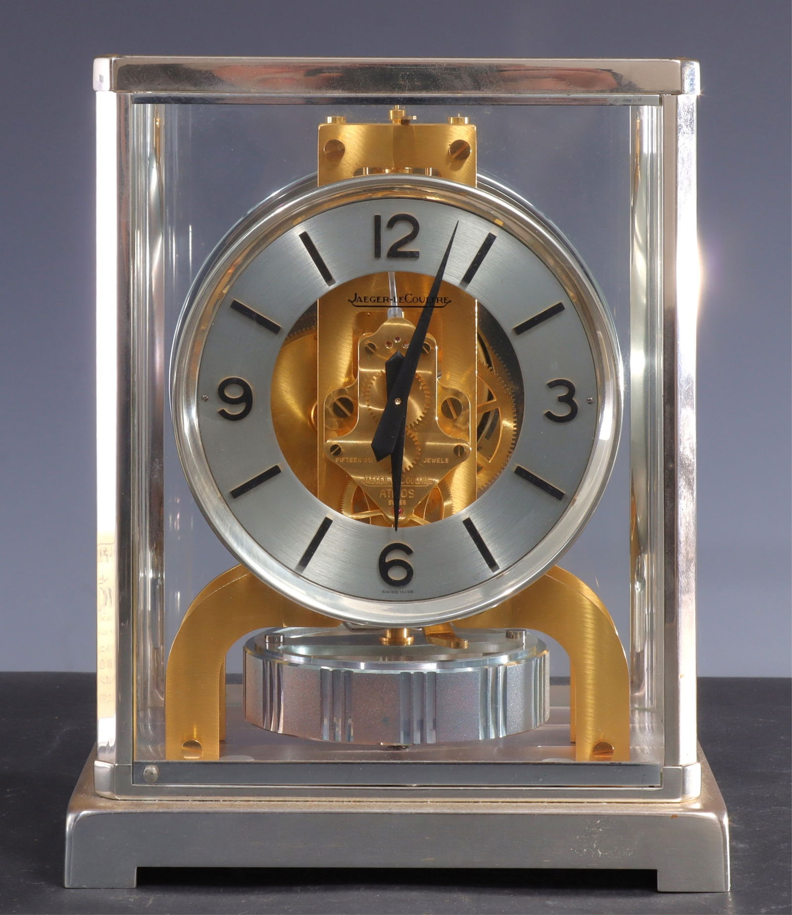 Jaeger-LeCoultre Atmos Mantel Clock: Atmos Baton. Glass and chromed metal case. Dedication/gift plaque to back of case. 8.75"H x 7W x 5.25