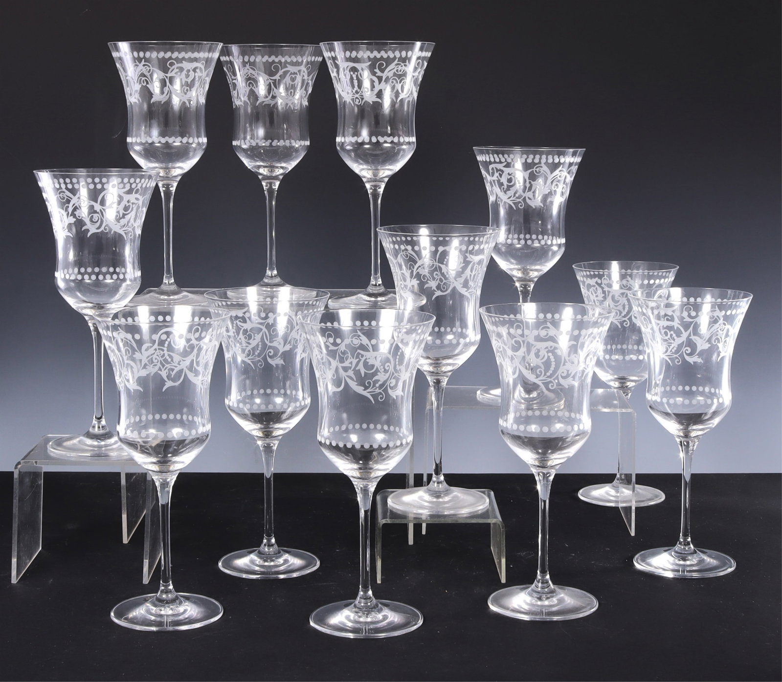 Set of 12 Etched Wine Glasses: Set of 12 Etched Wine Glasses. Vine Motif 9" H x 4" Dia Property from a Litchfield, CT home.