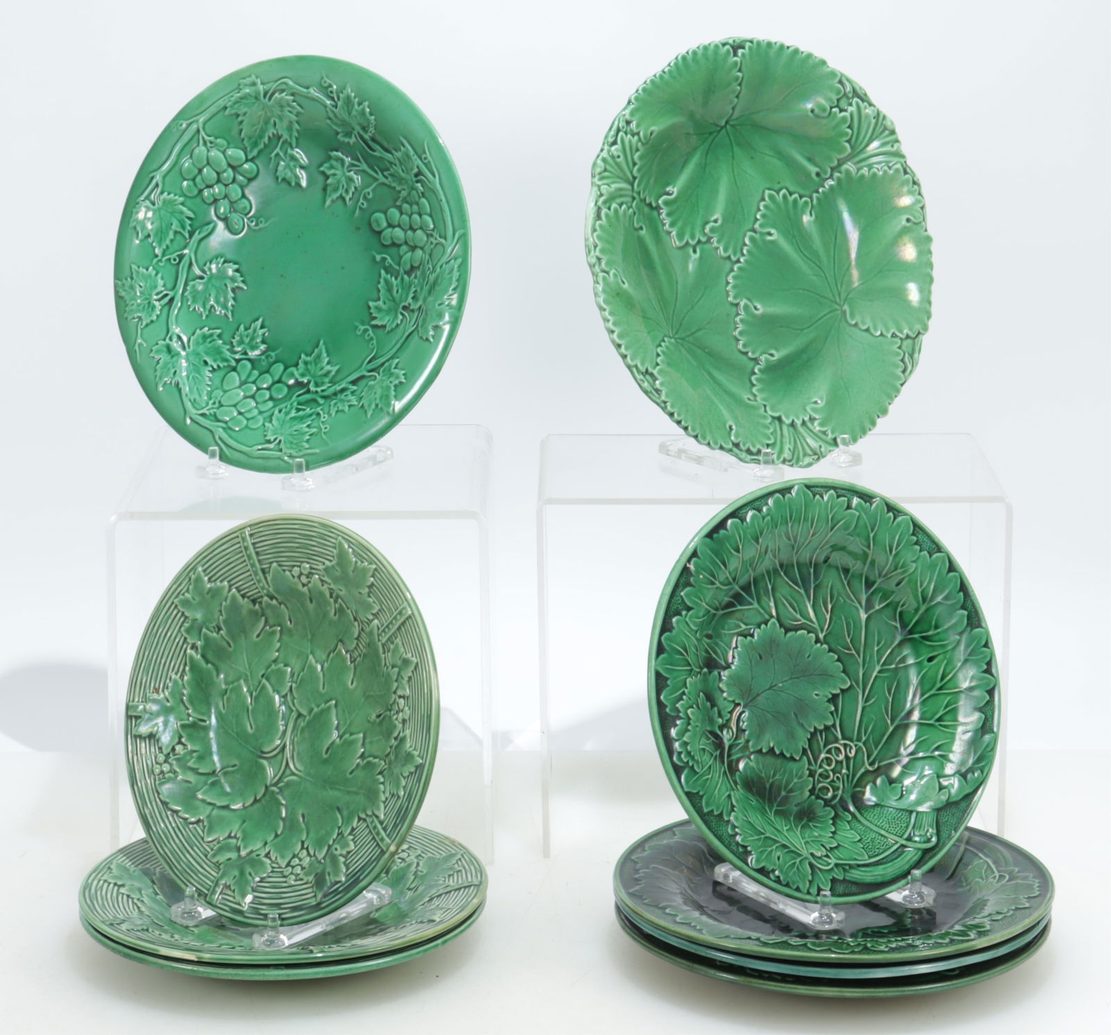 Nine 19/20C Green Majolica Plates: Larger plate marked Copeland. (3) marked Gien France. 8.25" to 9.25 dia. Property from a Northwest Connecticut collection.