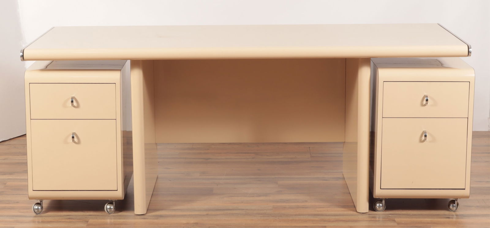 1970's Cream Formica & Metal Executive Desk: 1970's Cream Formica & Metal Executive Desk 29.5" H x 73.25" W x 30" D Property from a modern Poughkeepsie estate.