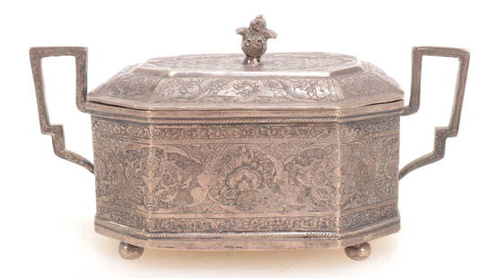 Engraved Octagonal Covered Silver Box Russian: Octagonal engraved covered two-handled box (reported to be Russian silver but can't find mark), with four ball feet. About 9 ozt total weight. 3 1/4" OH x 6" Width across handles x 3 1/8" D