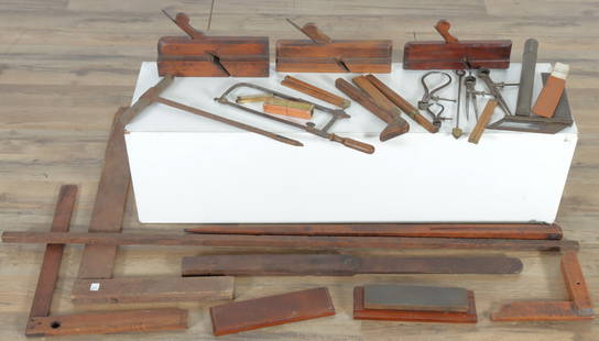 Group of Early Wood and Metal Tools: Assorted group of early wood and metal tools, 19th and 20th Century, comprising: 3 planes, 1 sharpening stone, 4 right angles, 1 compass, 1 iron drill/augur with wood handle; 1 boxed Sovereign & hall
