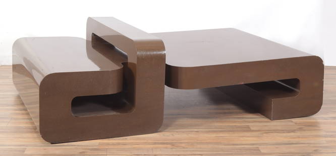 Karl Springer Sculptural Coffee Table: Karl Springer Sculptural Coffee Table, brown laminate finish over wood. Unsigned. 72" L x 48" W x 16" H. 22" H at overlapping portion.