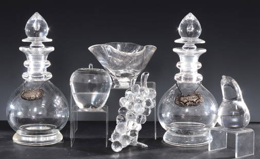 Six Steuben Glass Pieces: Six Steuben Glass Pieces, comprising: pair very heavy decanters with tear drop stoppers, 1950's, sterling silver scotch & bourbon labels, grape cluster, apple, pear and a triangular dish Decanters 11.