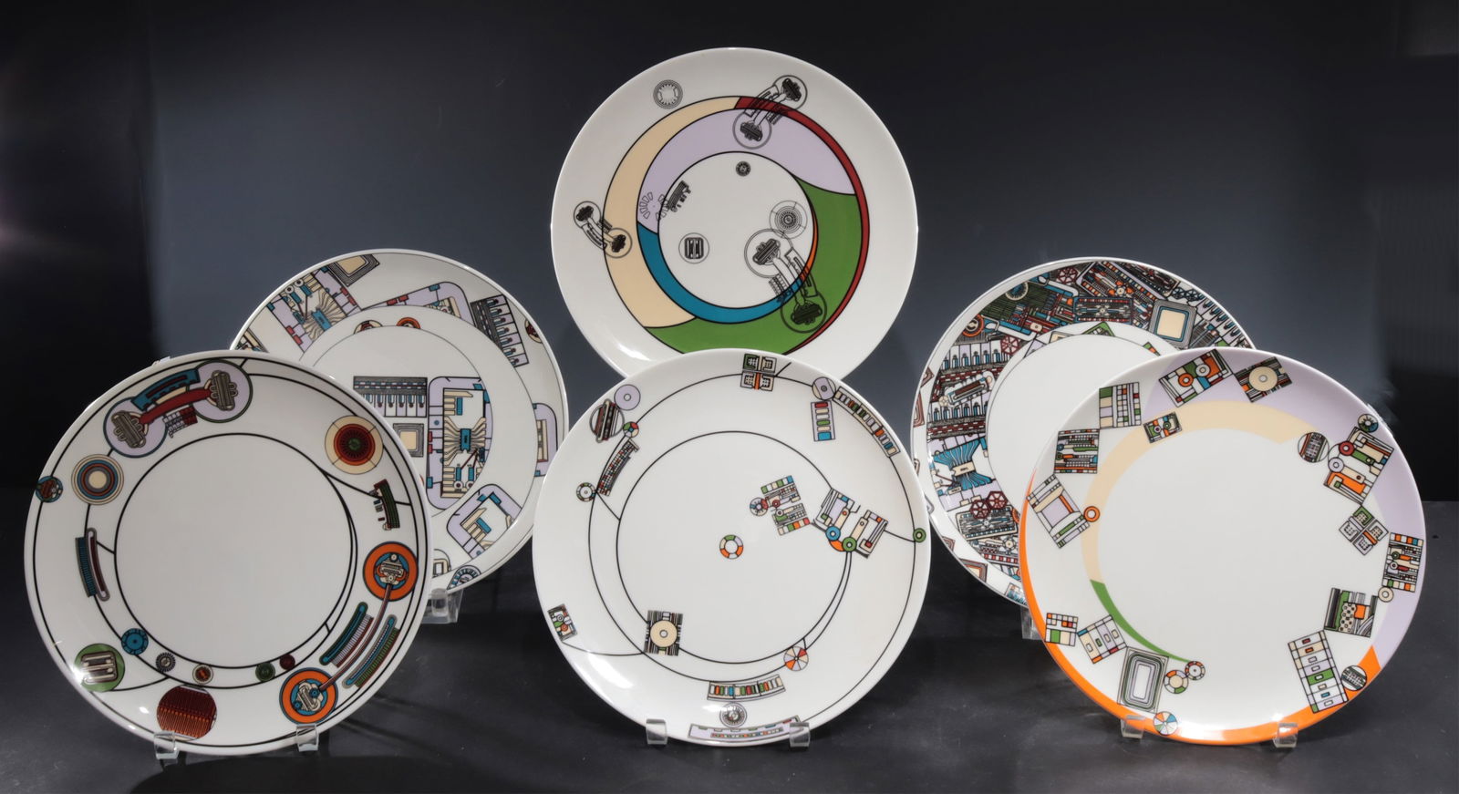 Six Eduardo Paolozzi Kalkulium Dinner Plates: A group of six Eduardo Paolozzi 'Kalkulium' series dinner plates, transfer-printed on Wedgwood fine bone china. In original box, numbered 106 of 500, 1997.Each plate 10.75" diameter