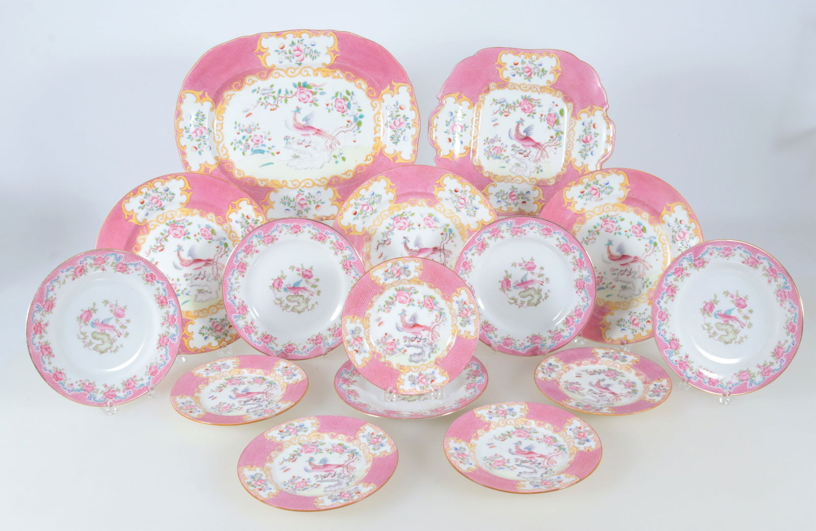 Group of Minton Cockatrice Porcelain Tableware: Group of Minton Cockatrice Porcelain Tableware. Comprising: platter, four dinner plates, four salad plates, six bread plates. Platter 13" W